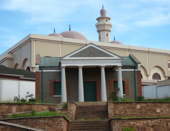photo showing the front view of fort Lugard and the back ground photo of the mosque