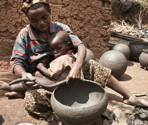 women demonstrating pottery a tradition of the batwa people